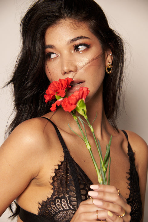 Model with flower wearing Fancy Bralette  from Lonarc Lingerie collection