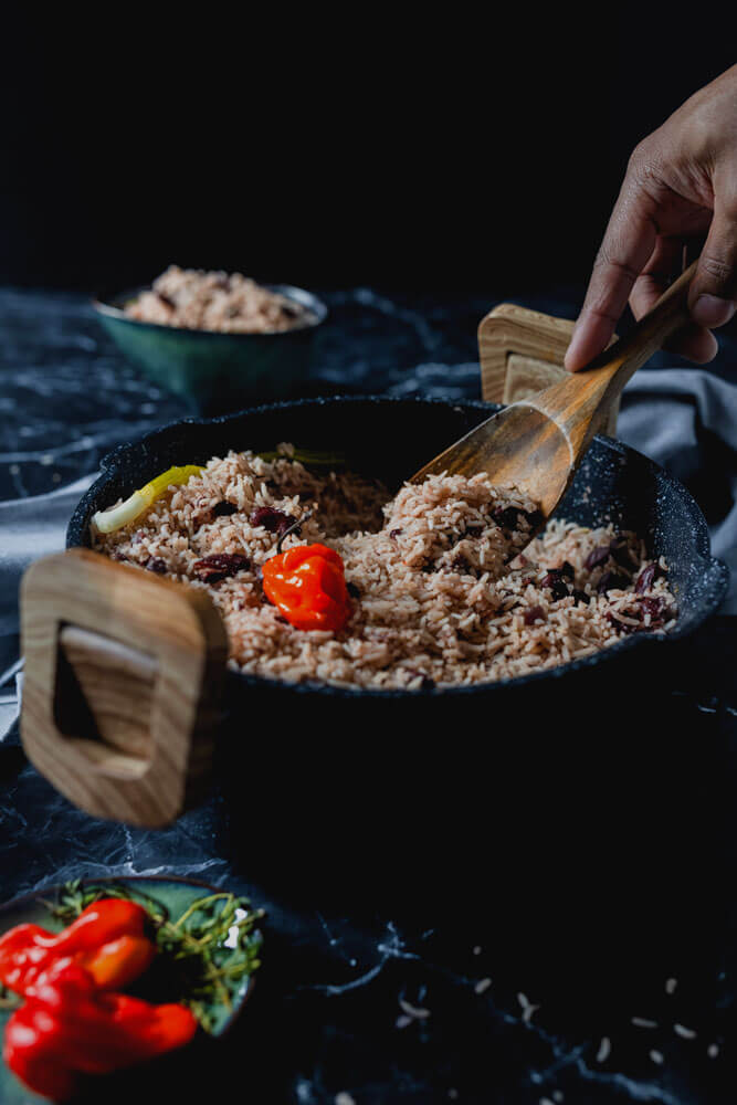 Close-up view of flavorful Jamaican rice and peas dish served in a bowl.