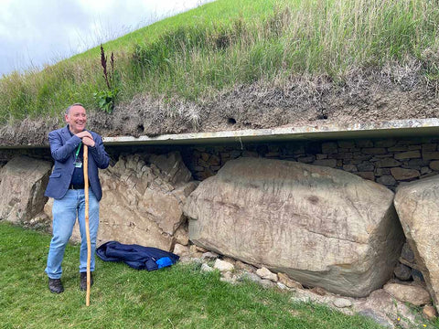 Anthony Murphy delivering a guided tour at the Calendar Stone, Knowth