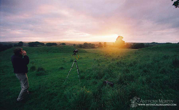 Anthony Murphy observing summer solstice sunrise at Dowth Henge in June 2000