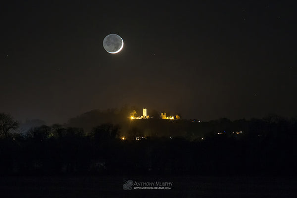 The first crescent 'new moon' above the Hill of Slane in the Boyne Valley.