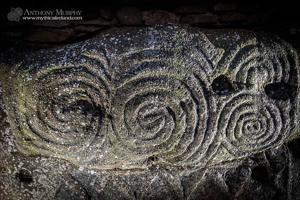 Spirals on kerb stone 52 at Newgrange