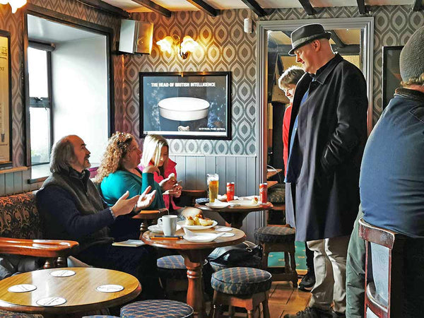 Dara Ó Briain chatting with Richard Moore during a break in filming.