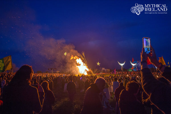 Crowds watch as the Uisneach fire is lit