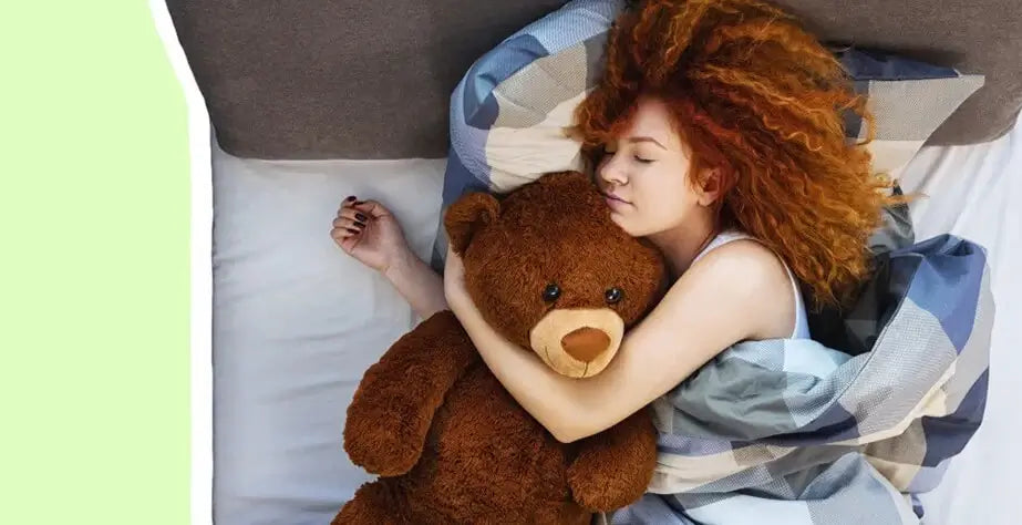 8 Reasons Why Adults Should Own Stuffed Toys- Sleeping woman and stuffed toy