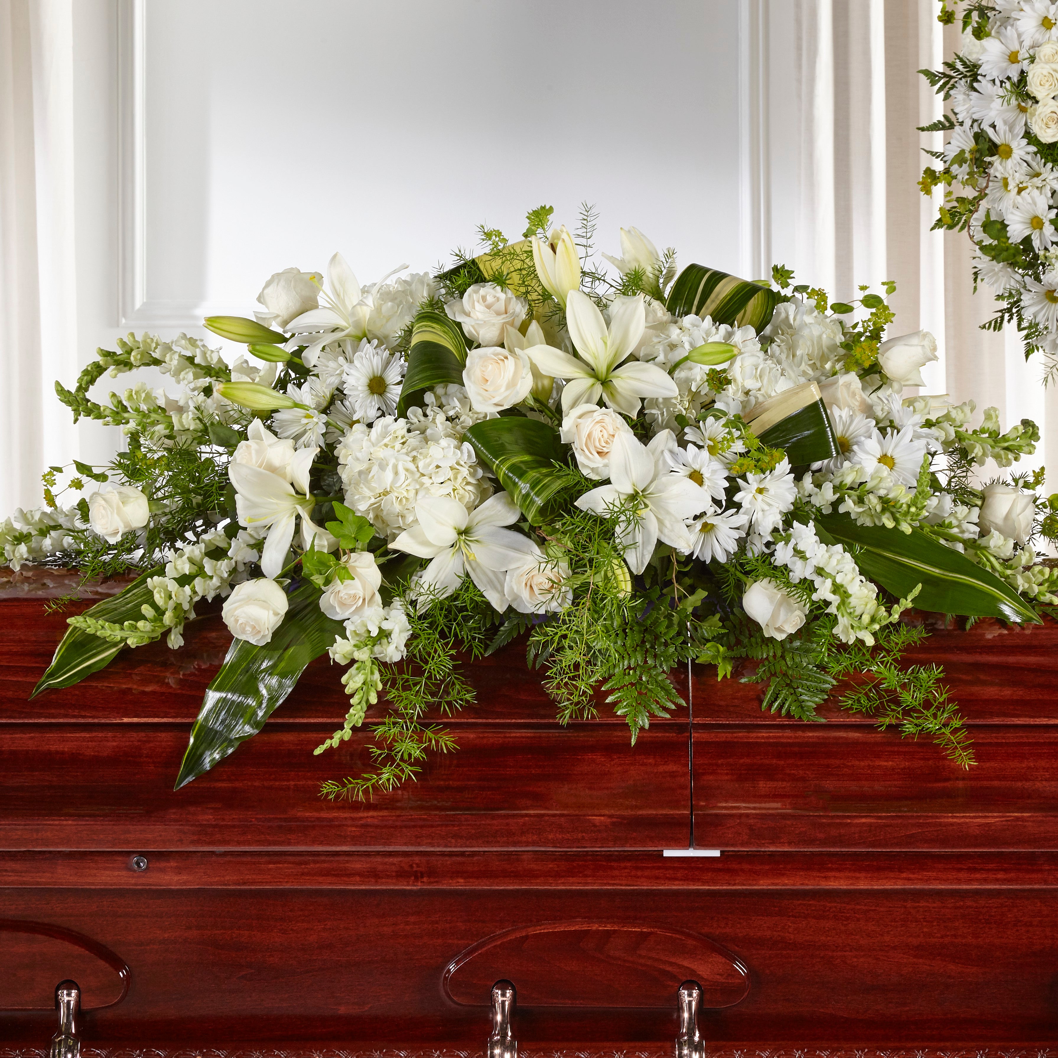WHITE AND GOLD REST CASKET FLOWERS in Henderson, NC - The People's Choice  D'Campbell Floral D'Zign Studi