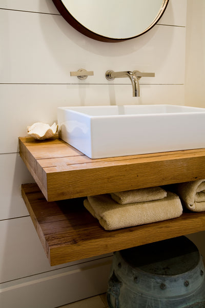 Using reclaimed barn wood for a bathroom sink vanity