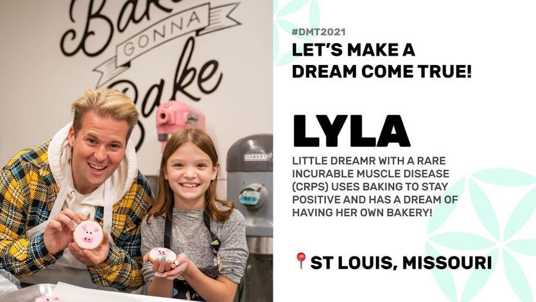 Charlie takes a photo with Lyla, a young girl who created an online cookie shop with the help of the Dream Machine.