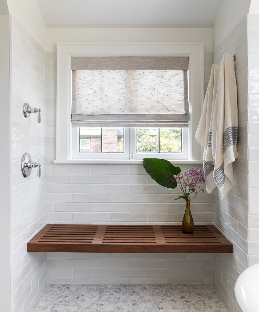 shower remodel wooden bench sitting area