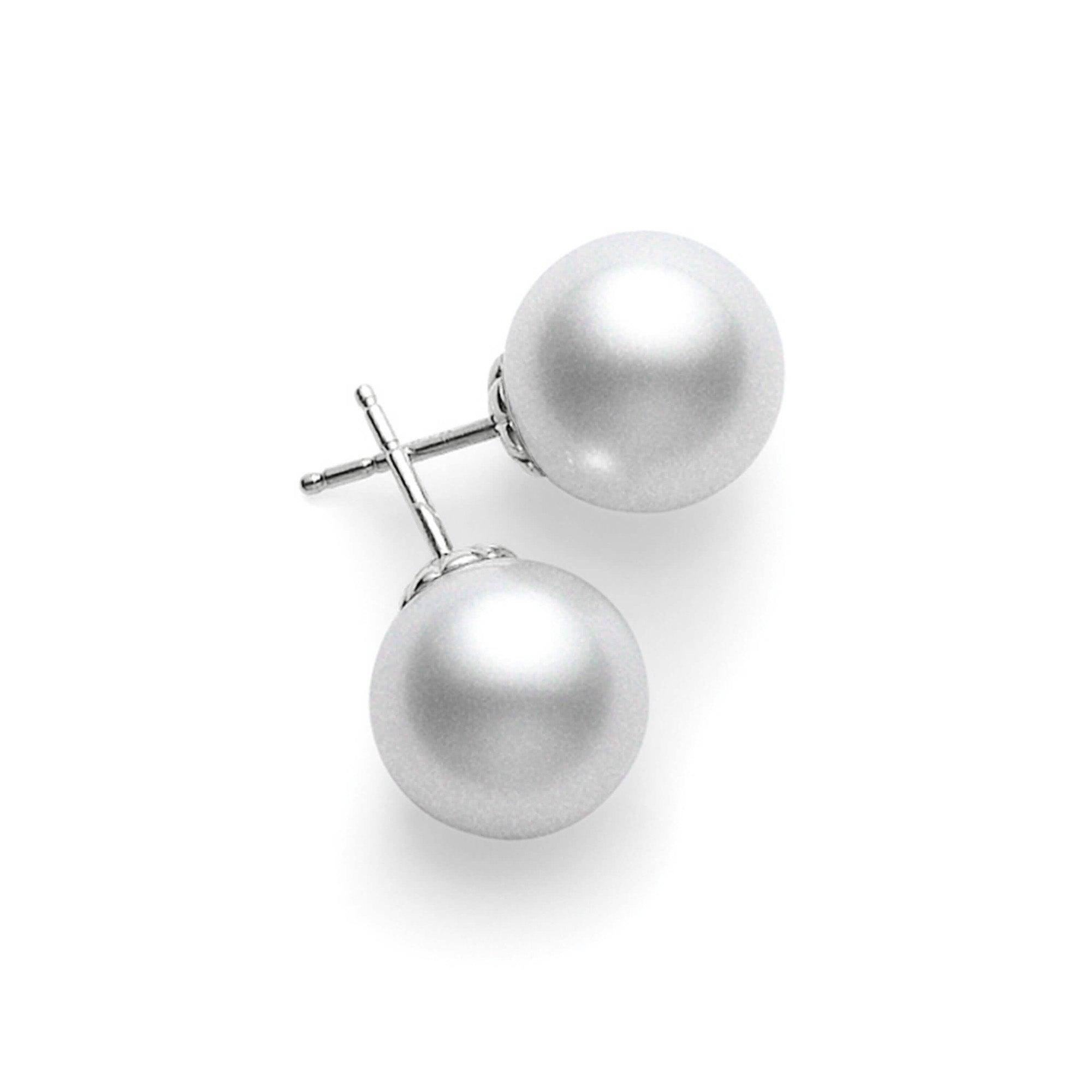 18 karat gold white pearl gemstone handmade earrings at ₹29800 | Azilaa