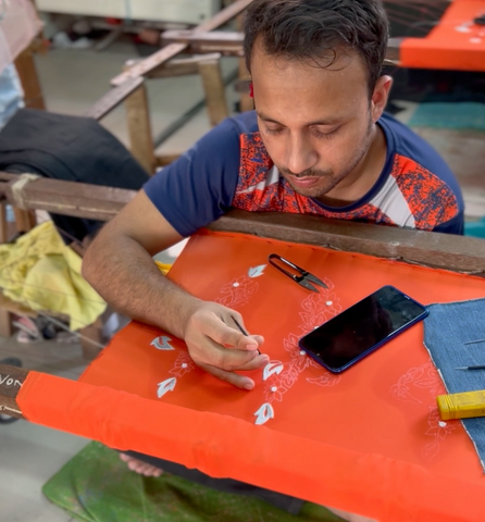 Artisan from Kay Kraft Bangladesh working on an embroidered garment that will require two weeks to complete. Credit: Courtesy