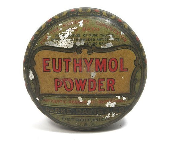 Old packaging of euthymol tooth powder