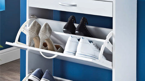 several pairs of shoes in shoe cabinet