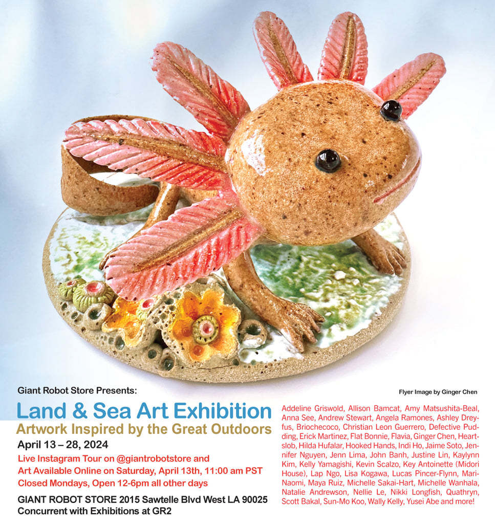 Land and Sea Art exhibition flyer contains an image of a axolotl looking up towards the right on top of a circle with grass and flowers. It's a sculpture and it is shiny.