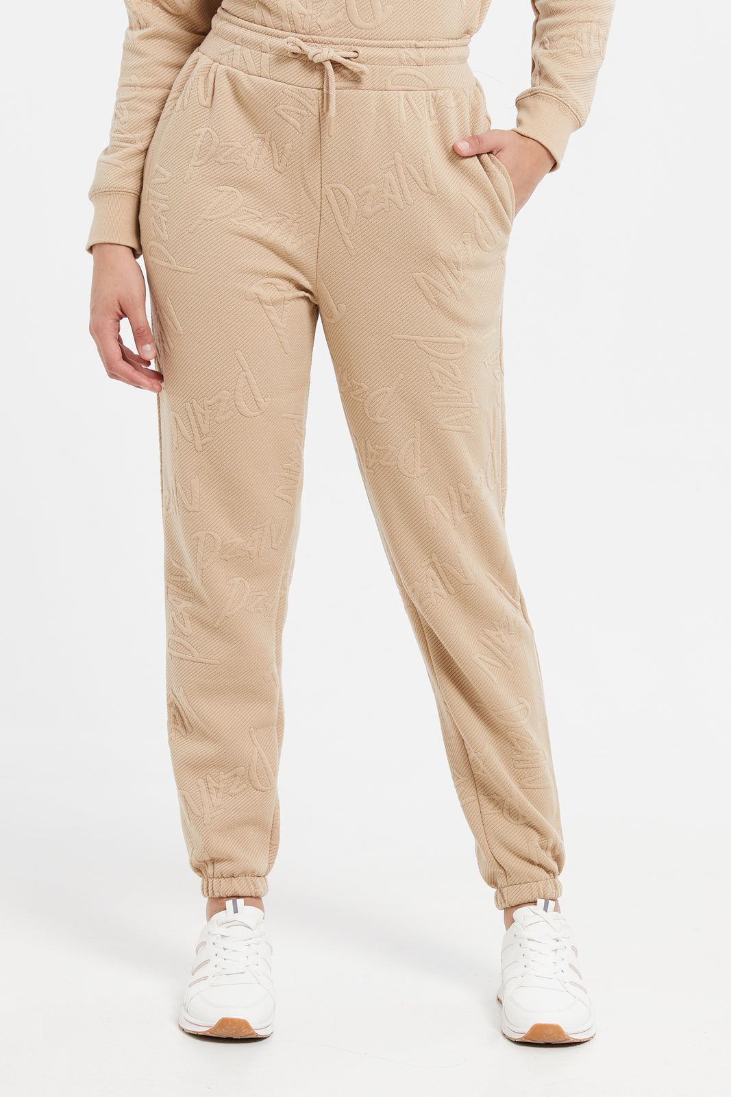 

Women Brown Textured Regular Joggers