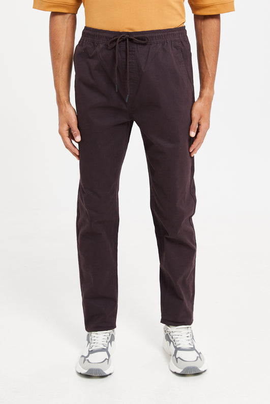 Relaxed Fit Twill pull-on trousers - Light beige - Men | H&M