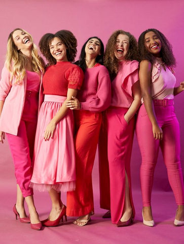 women wearing pink dresses, tops and trousers