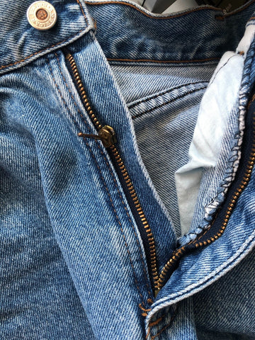 Jeans with a button and a zipper