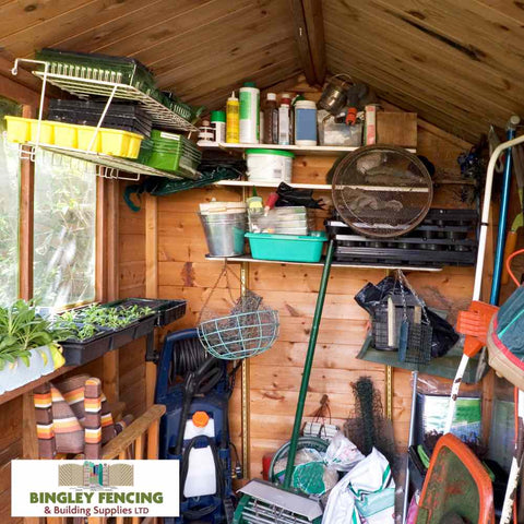 Internal view of shed with lots of tools