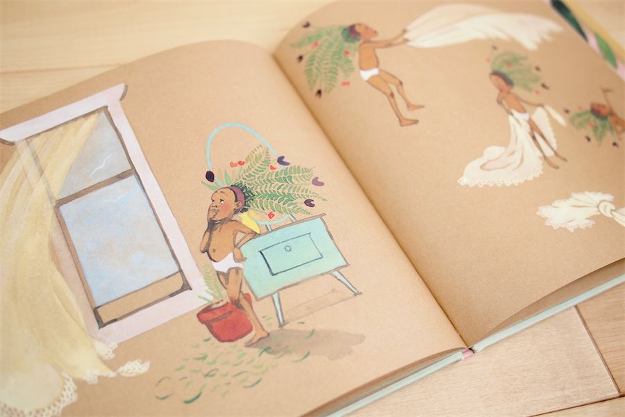 An interior spread from the book "Julián is a Mermaid," showing Julián dressed as a mermaid and gazing out an open window