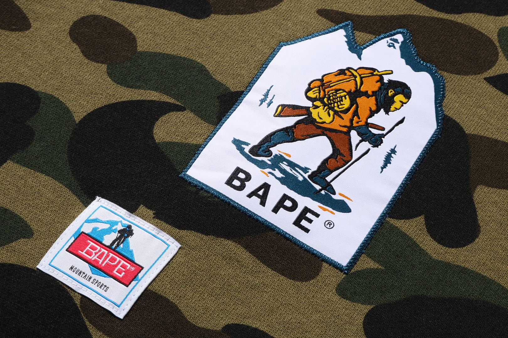 MULTI LABEL 1ST CAMO OVERSIZED HOODIE