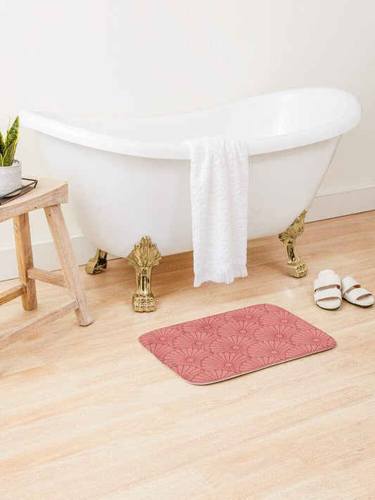 Red Flower on Strawberry Pink Bath Mat.   Japanese style bathmats are the perfect finishing flourish for a stylish, personality-filled bathroom, and this bath mat is as practical, as it is stylish - the anti-slip backing keeps the bath mat firmly in place and reduces the risk of slipping. 100% Microfiber. Vibrant print exit in 2 sizes 34” x 21” (86 x 53 cm) or 24” x 17” (61 x 43 cm). Anti-slip backing. Binding around the edges. Machine wash cold, gentle cycle. Tumble dry low or line dry. 