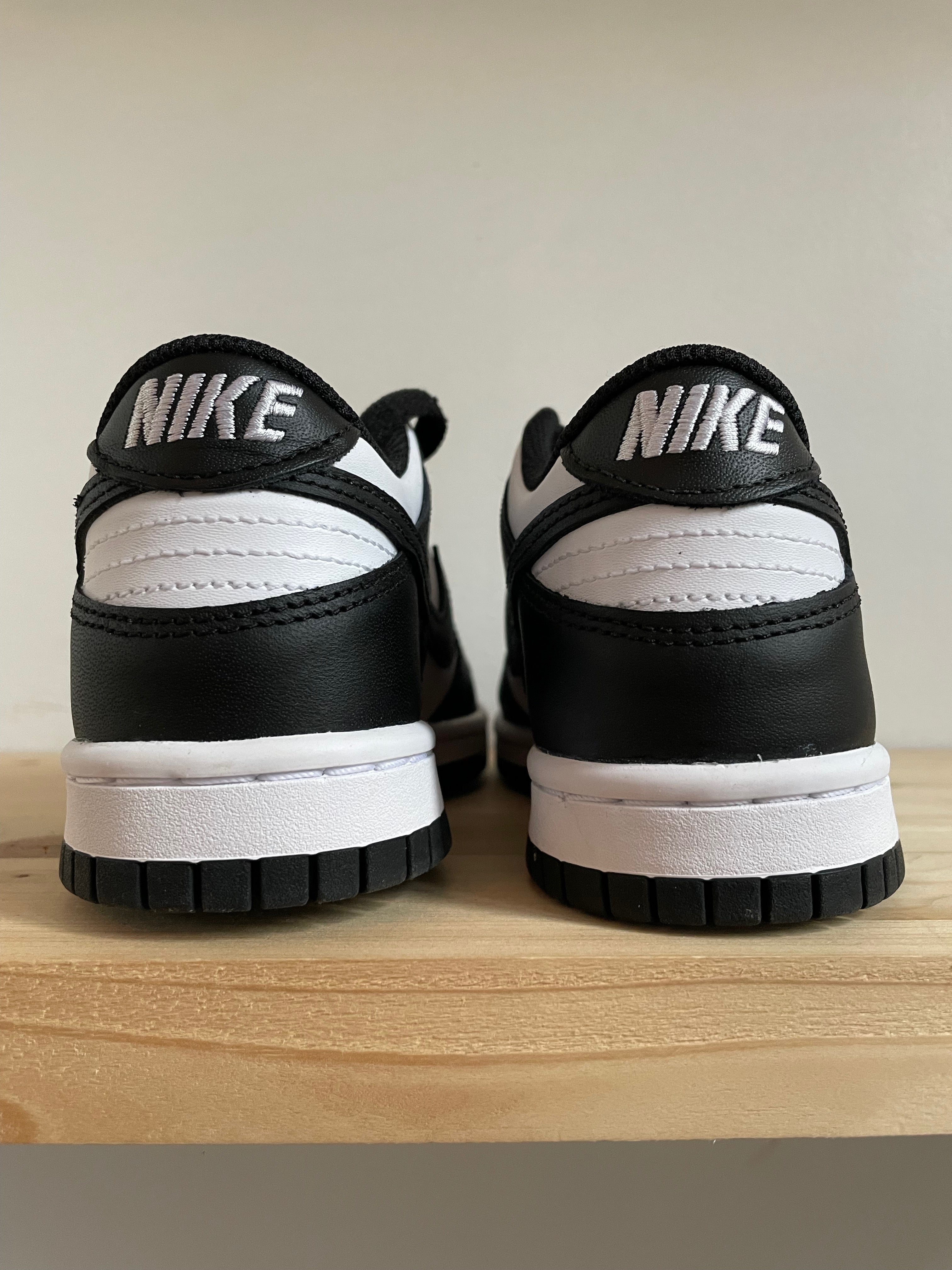 nike dunk low retro white black panda stores