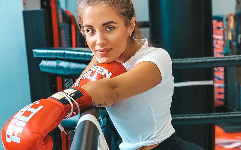 women posing with her GreenHill Boxing Gloves