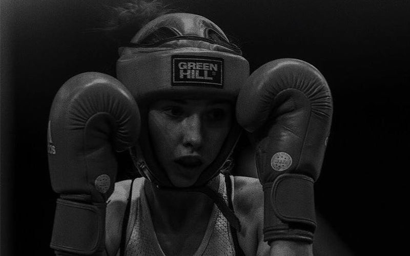 women practising wearing Black GreenHill Boxing Gloves