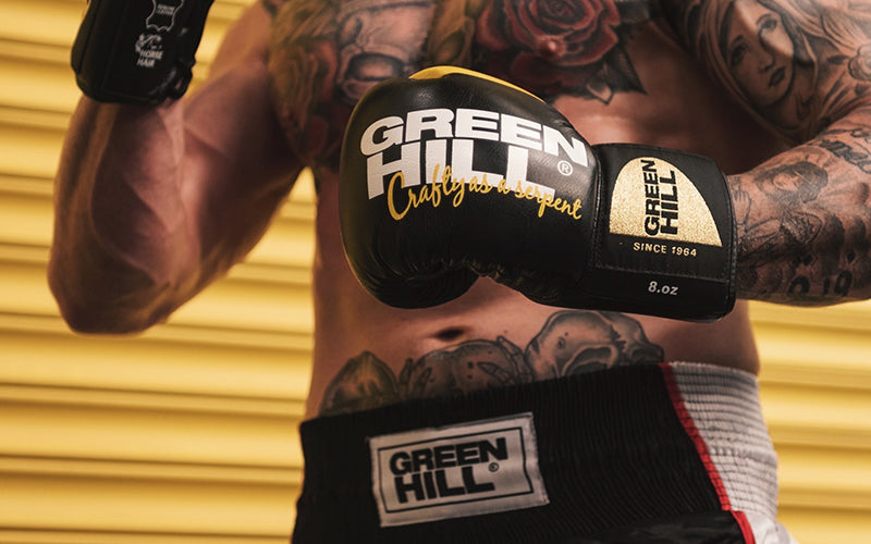 Athlete wearing GreenHill boxing gloves
