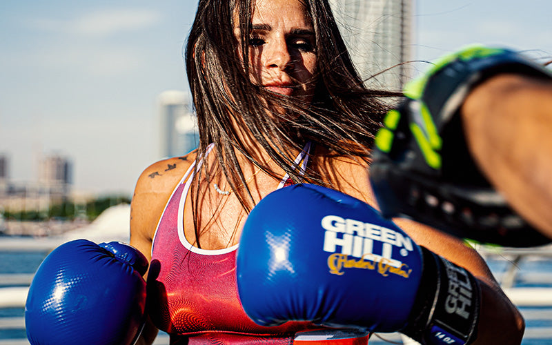 women wearing boxing gloves