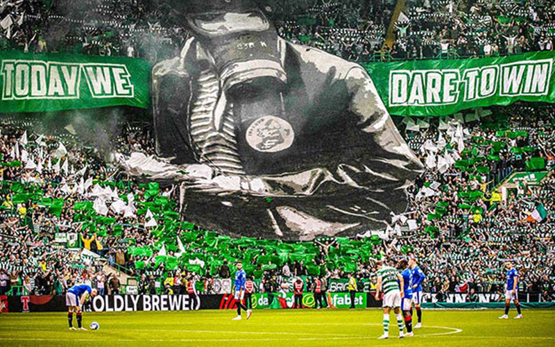 Celtic & Rangers players greeting with a huge tifo in the BG