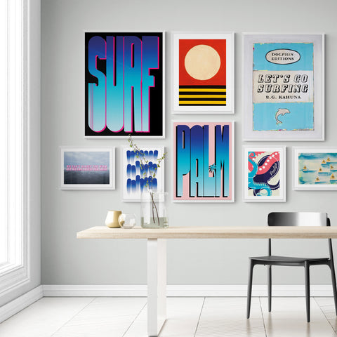 Create a gallery wall full of prints which have a common vibe for cohesion 