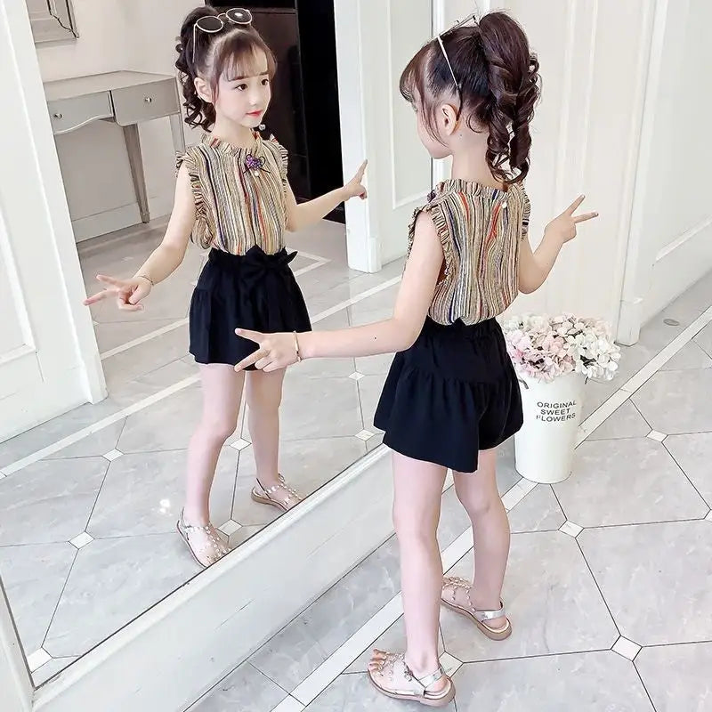 https://cdn.shopify.com/s/files/1/0604/5627/2030/products/striped-ruffle-trim-shirt-with-bow-tie-flare-shorts-set-3-4t-yellow-cute-toddler-girl-306.webp