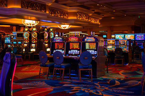 Interior of a casino, showing electronic games with LED displays.