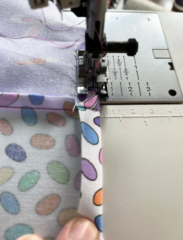 Side edge being sewn