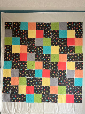 Arranging fabric pieces for quilt