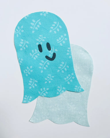 eyes and mouth appliqued on ghost