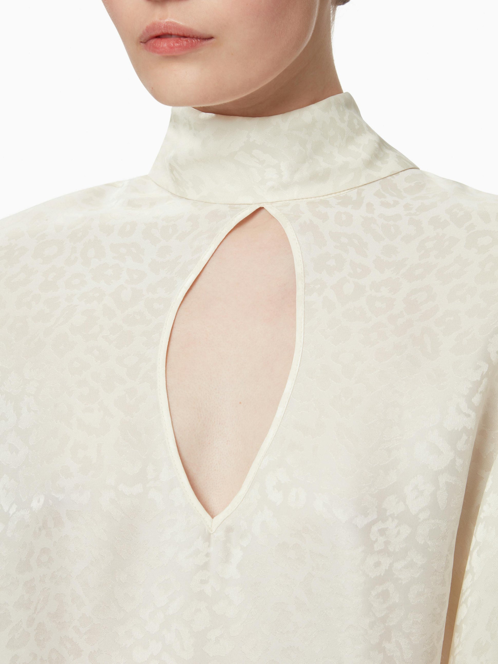 Leopard-jacquard cut-out blouse in creme - Nina Ricci