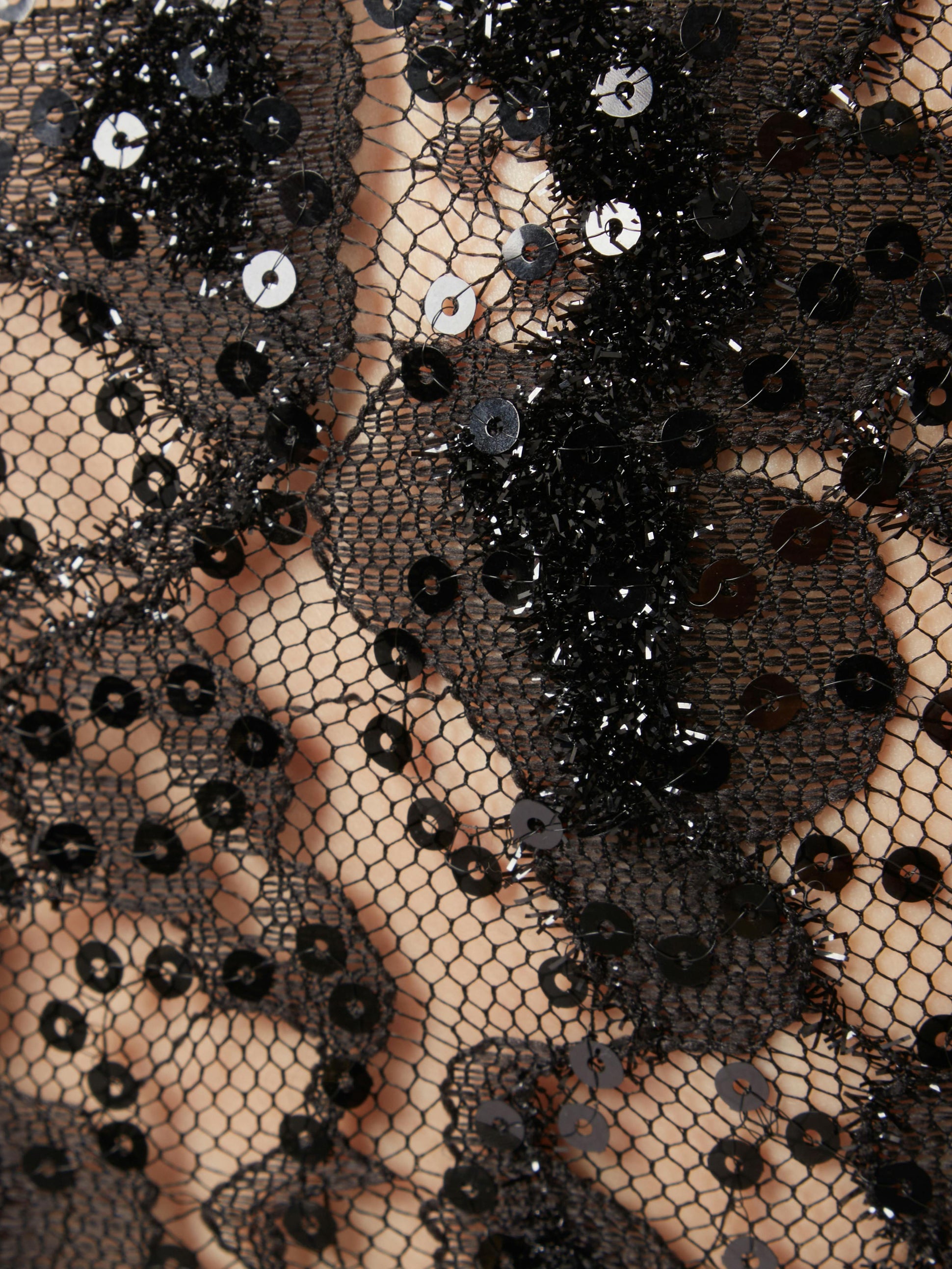 Sequin lace cut-out top in black - Nina Ricci