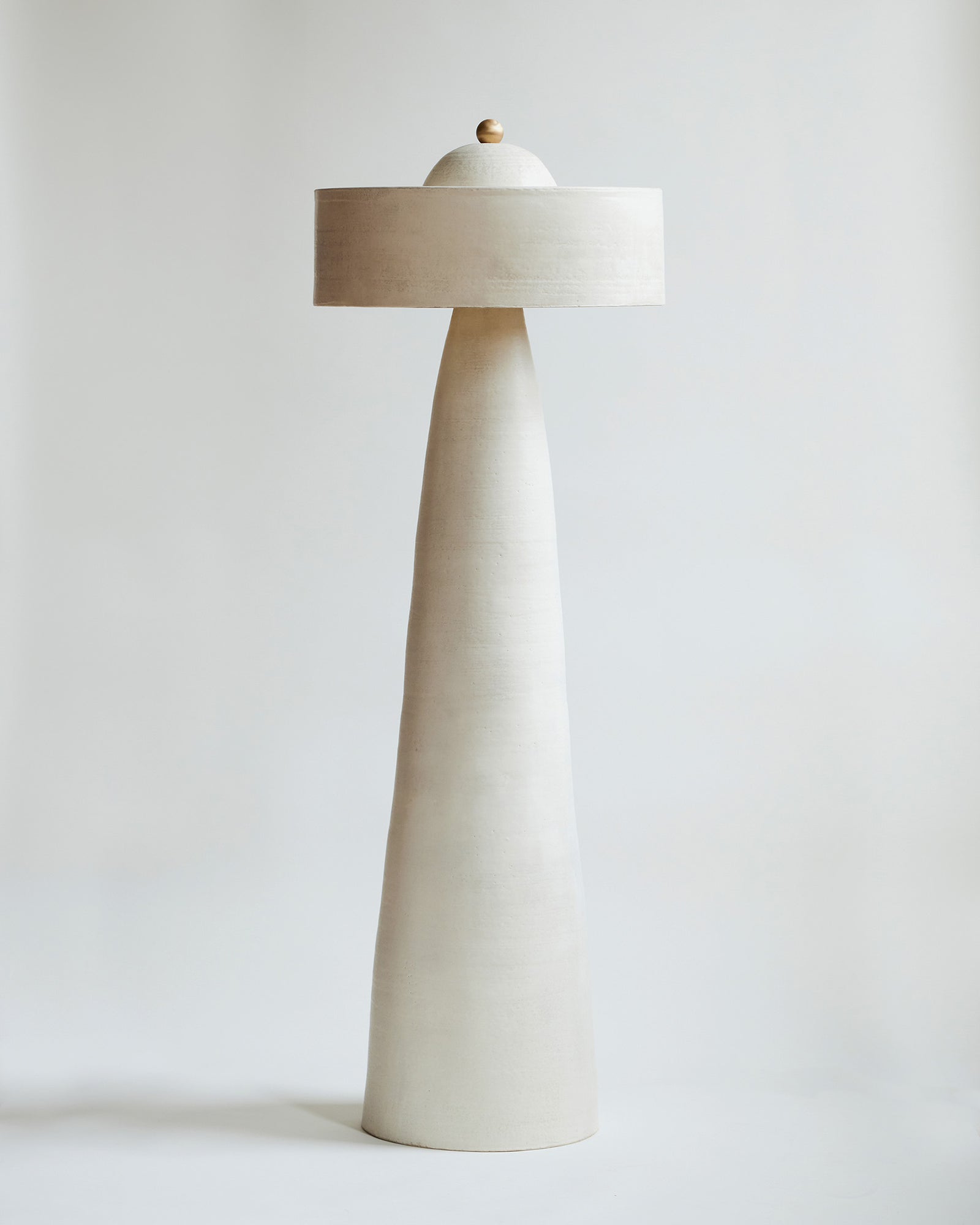 Helena Floor Lamp in Stone with Brass hardware