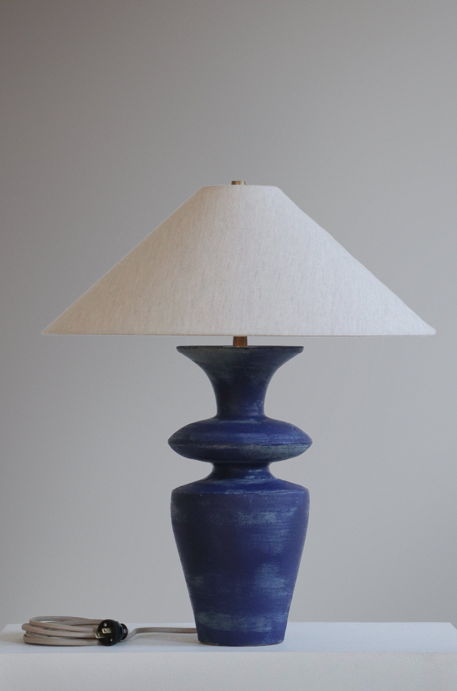 Rhodes Lamp in Lapis Finish with oatmeal linen shade