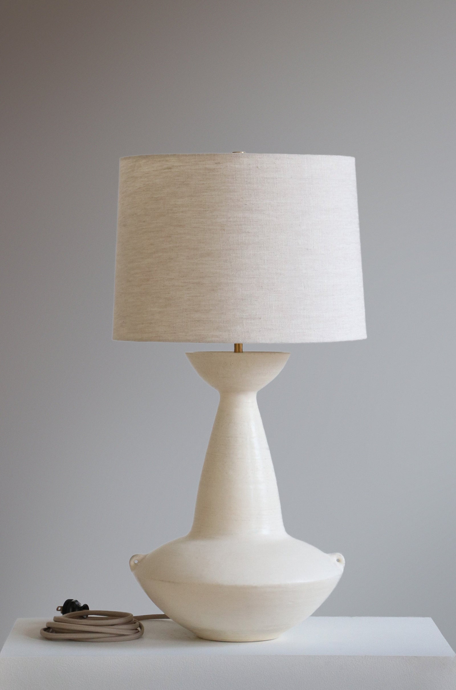 Claudius Lamp in Stone with oatmeal linen shade