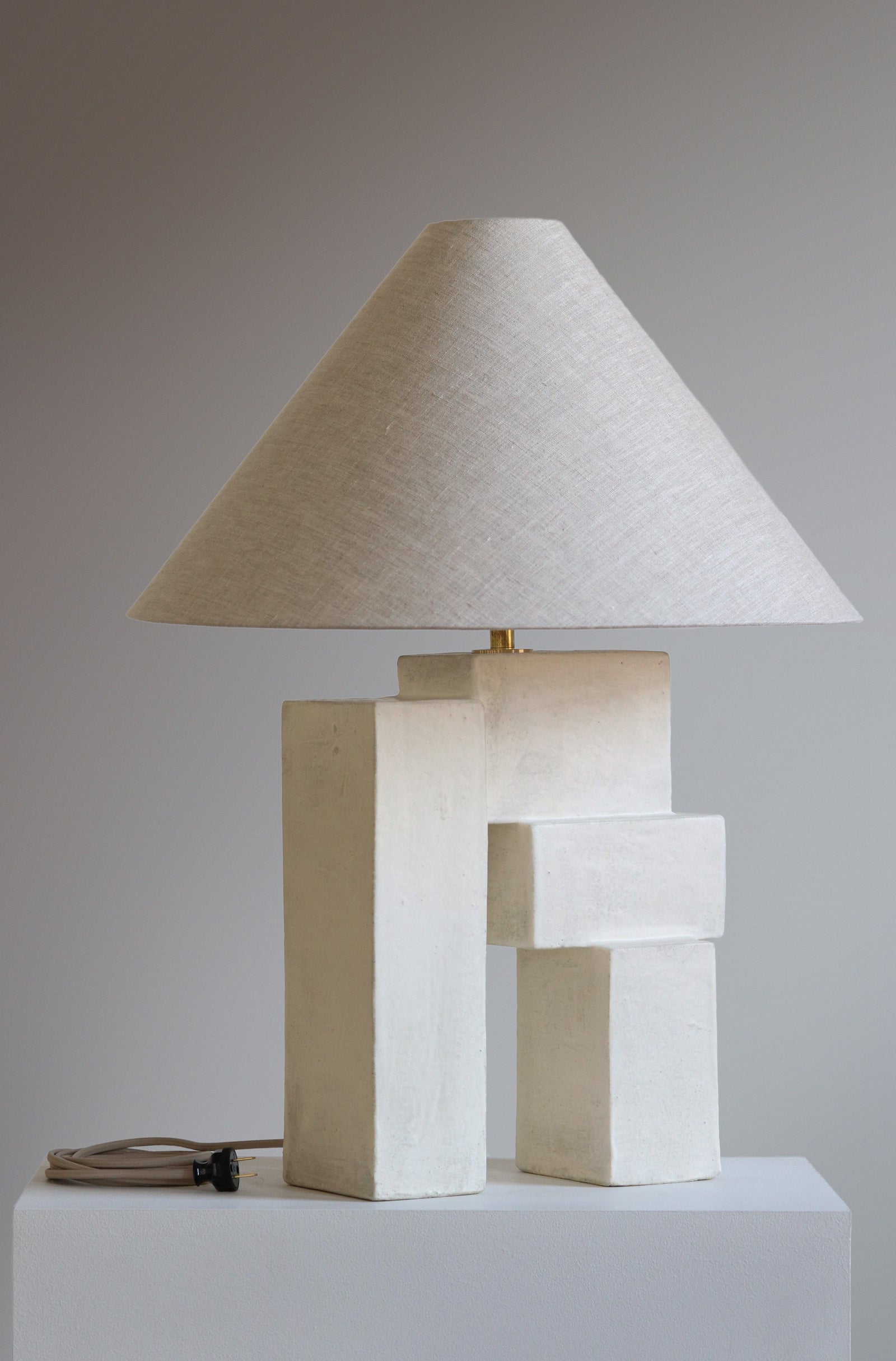 Emma Lamp shown in Stone finish with Oatmeal Linen Shade