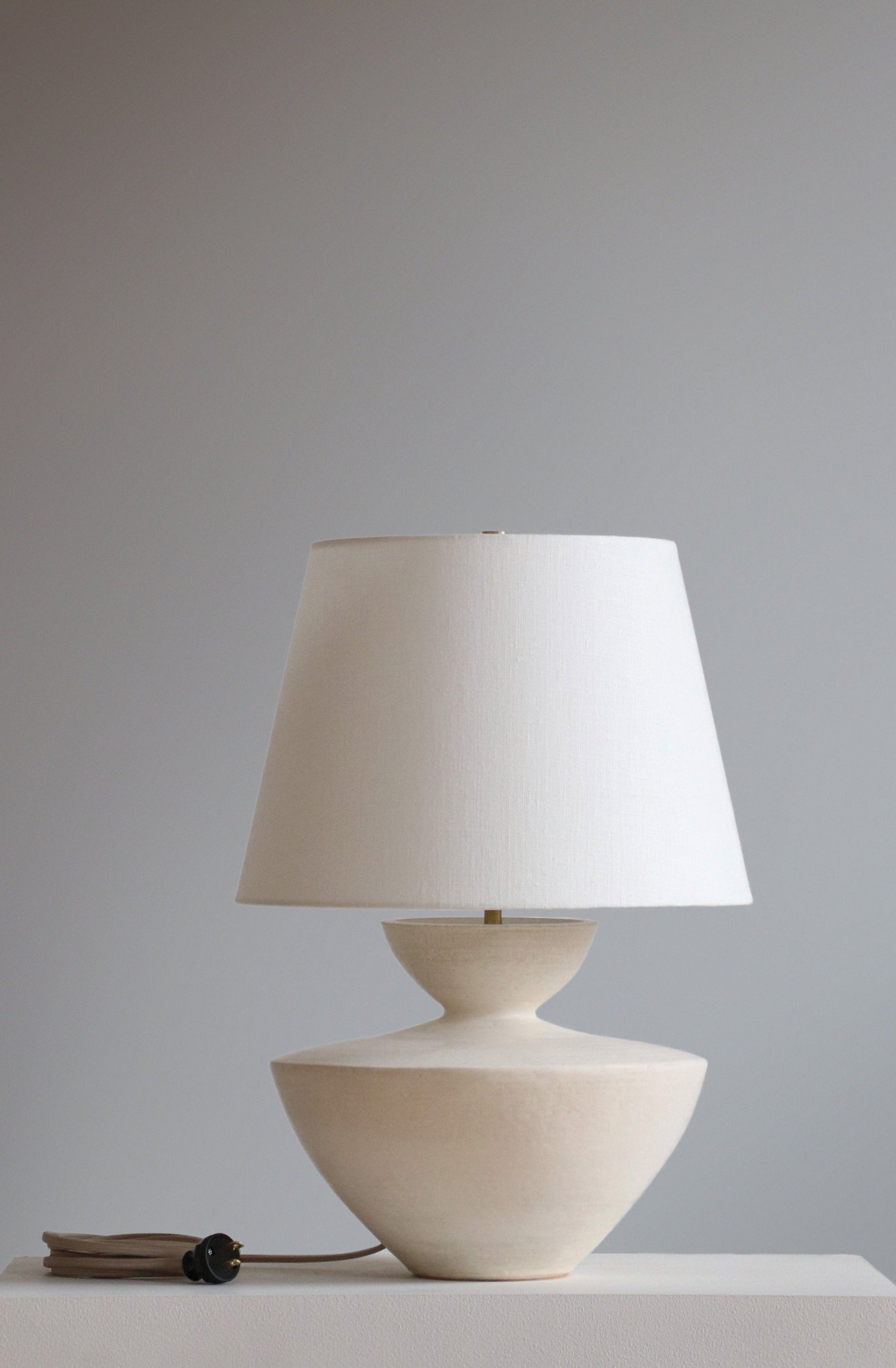 Tauria Lamp in Stone Finish with Off White Linen Shade