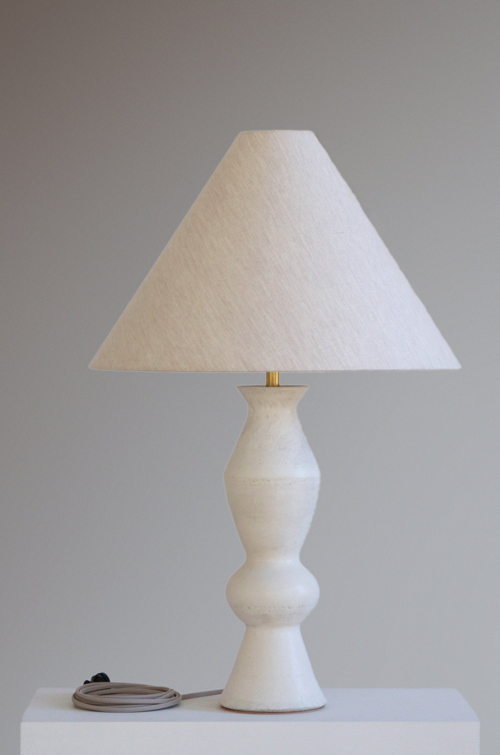 Titus Lamp in Stone with Oatmeal Linen Shade