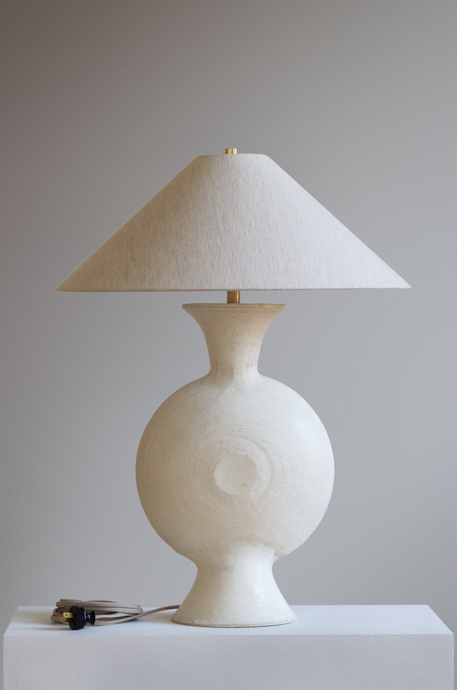 Antonia Lamp in Stone with Oatmeal Linen Shade