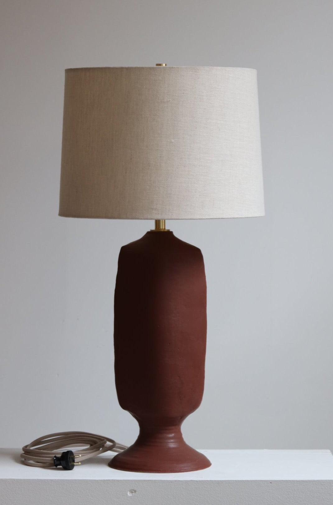 Castur Lamp shown in Chestnut finish 