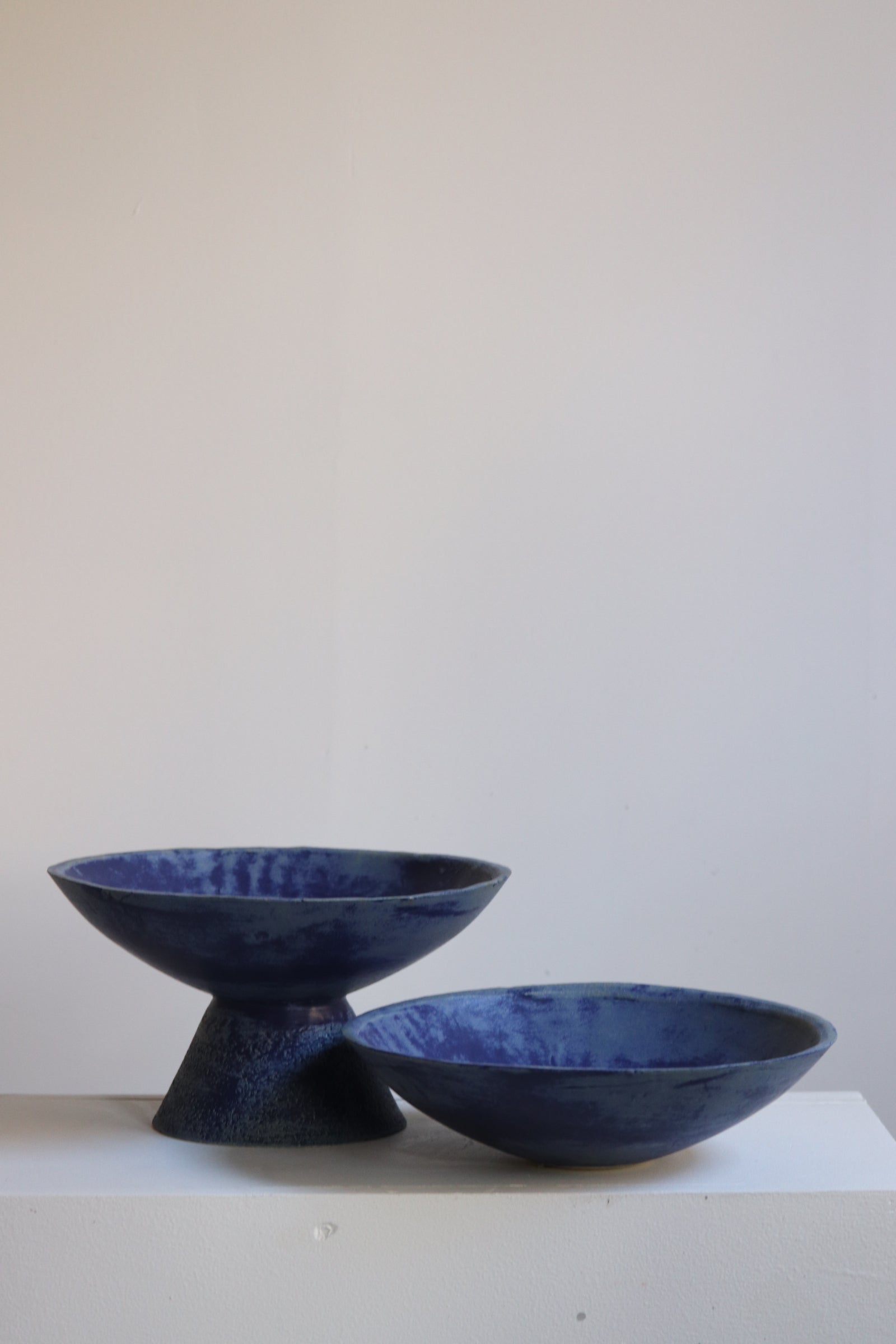 Tall Footed Bowl shown with Serve Bowl 14", both in Lapis