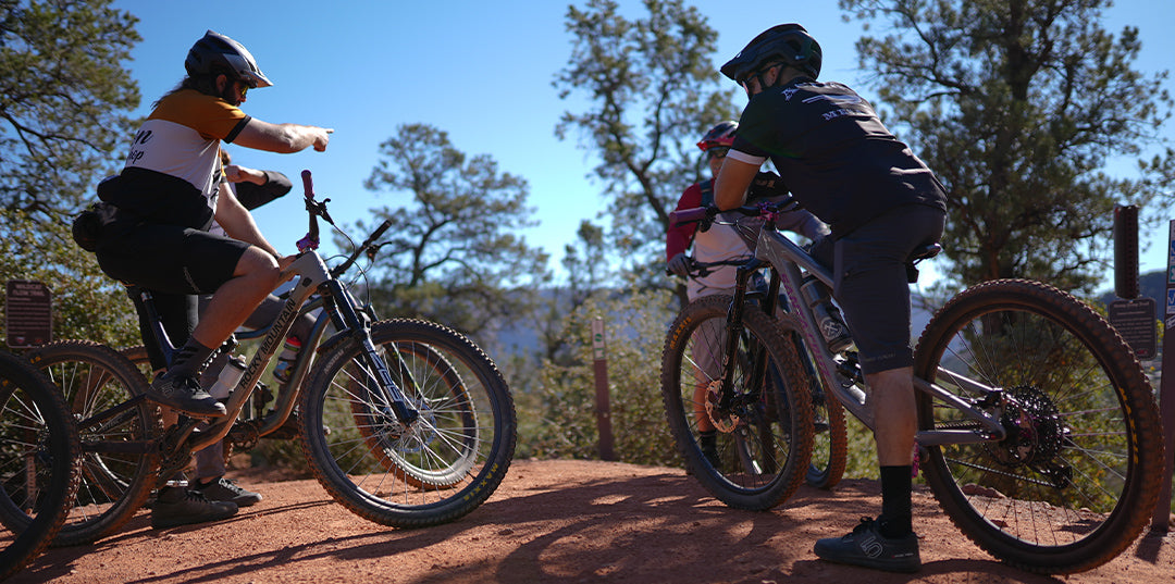 mountain bike riders on trail for a skills clinic